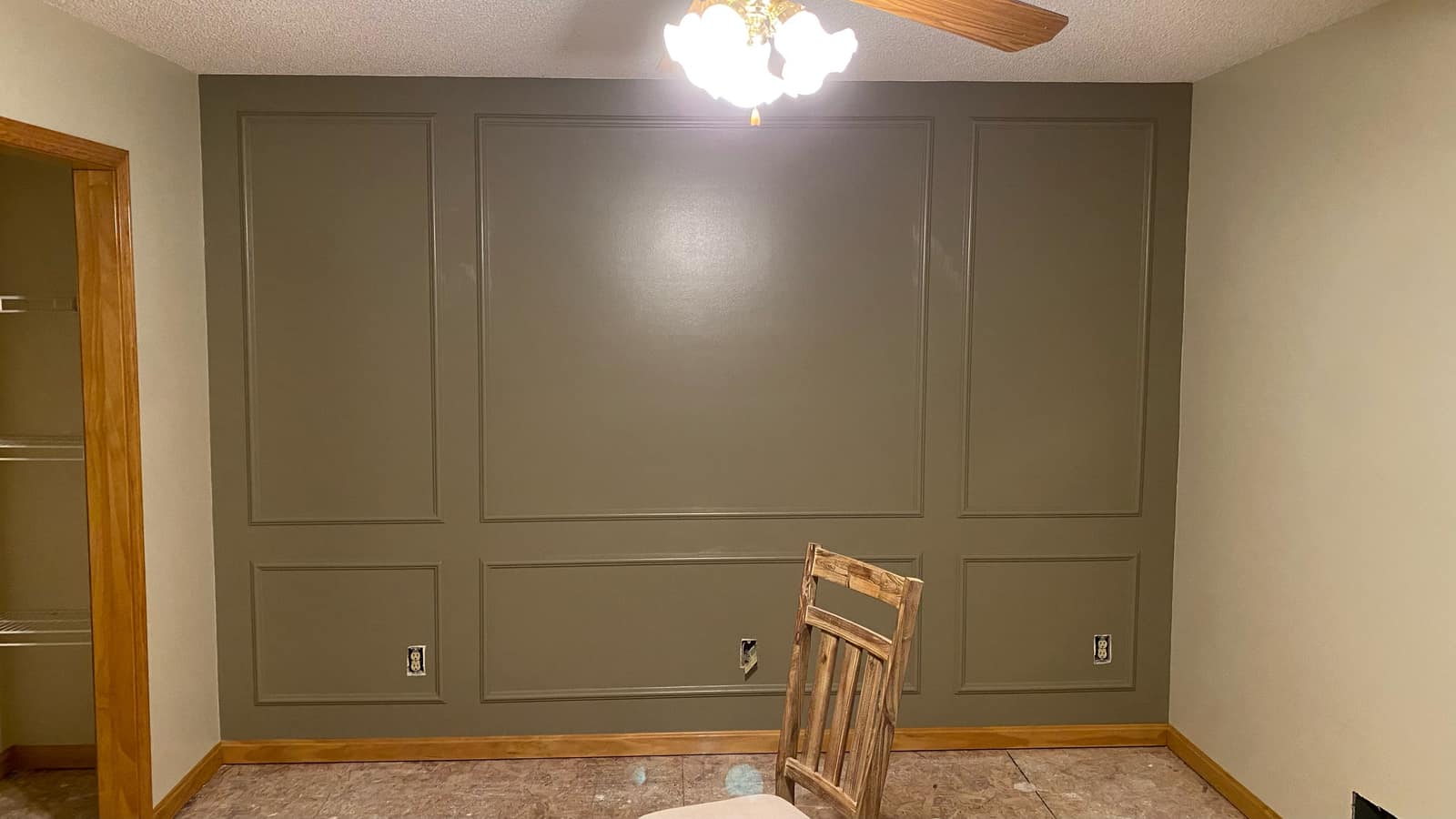 Painted accent wall with picture-frame trim molding